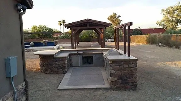 A large outdoor grill with an open roof.